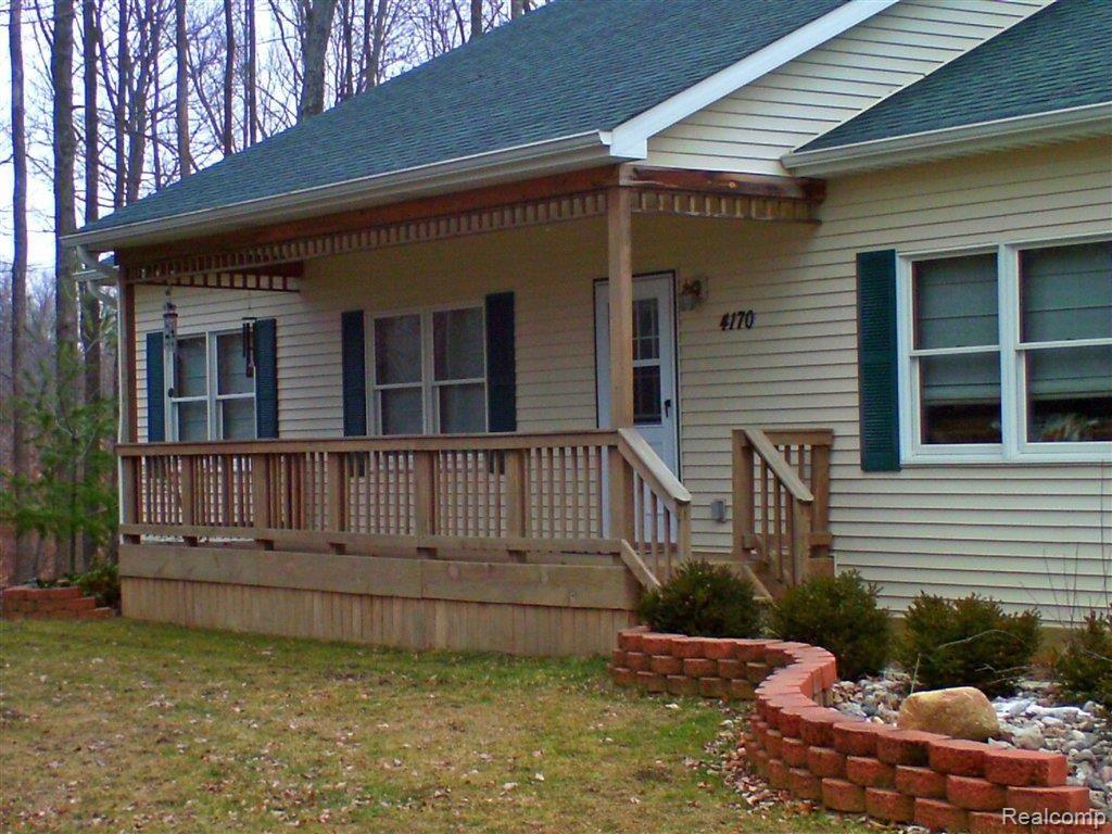 4170 Catlin Road Columbiaville, MI 48421 - Photo 19 of 25 Front deck.JPG