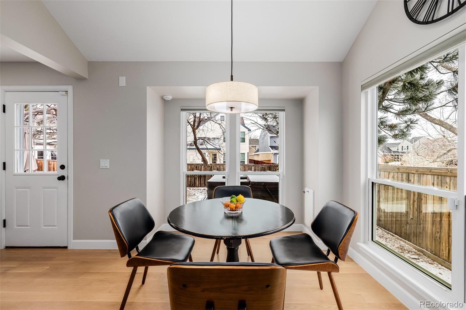 8827 South Cactus Flower Way Highlands Ranch, CO 80126 - Photo 13 of 49 a view of a dining room with furniture window and outside view