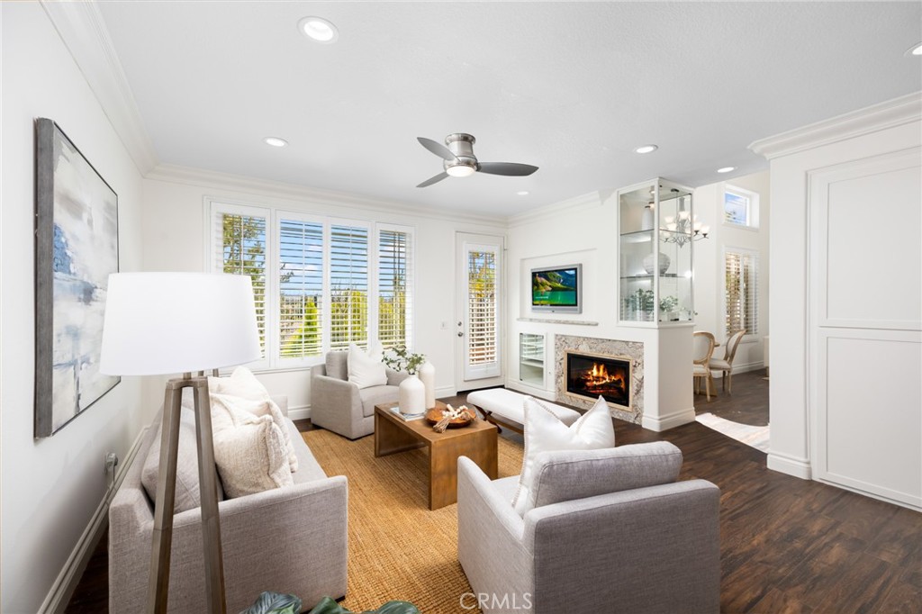 29 Beaulieu Lane Lake Forest, CA 92610 - Photo 17 of 60 a living room with furniture fireplace and a large window