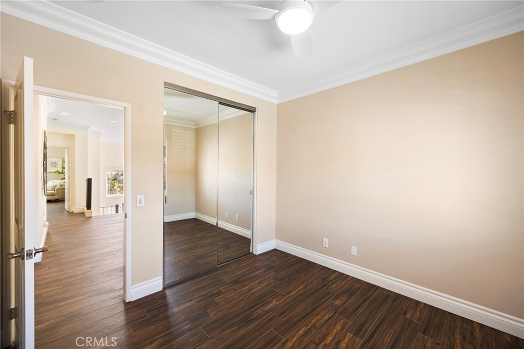 29 Beaulieu Lane Lake Forest, CA 92610 - Photo 31 of 60 a view of a hallway with wooden floor