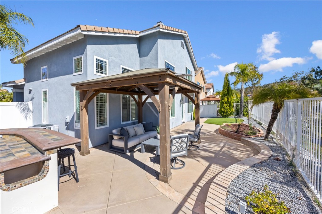 29 Beaulieu Lane Lake Forest, CA 92610 - Photo 43 of 60 a view of a dinning table and chairs in patio