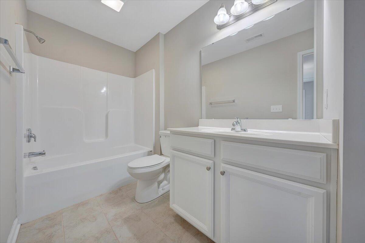 5631 Huntridge Road Roanoke, VA 24019 - Photo 17 of 19 a bathroom with a sink a toilet and shower
