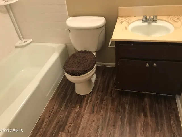 a bathroom with a sink and a toilet