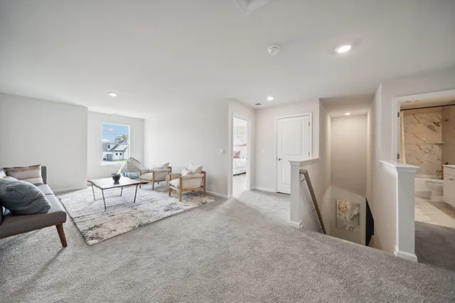 a living room with furniture and a table