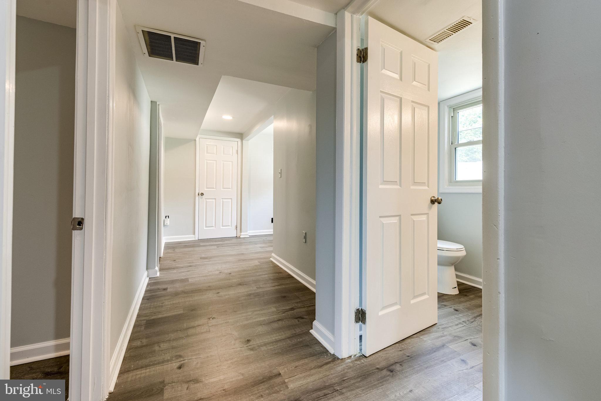 12824 Glynis Road Clinton, MD 20735 - Photo 19 of 31 lower level hallway