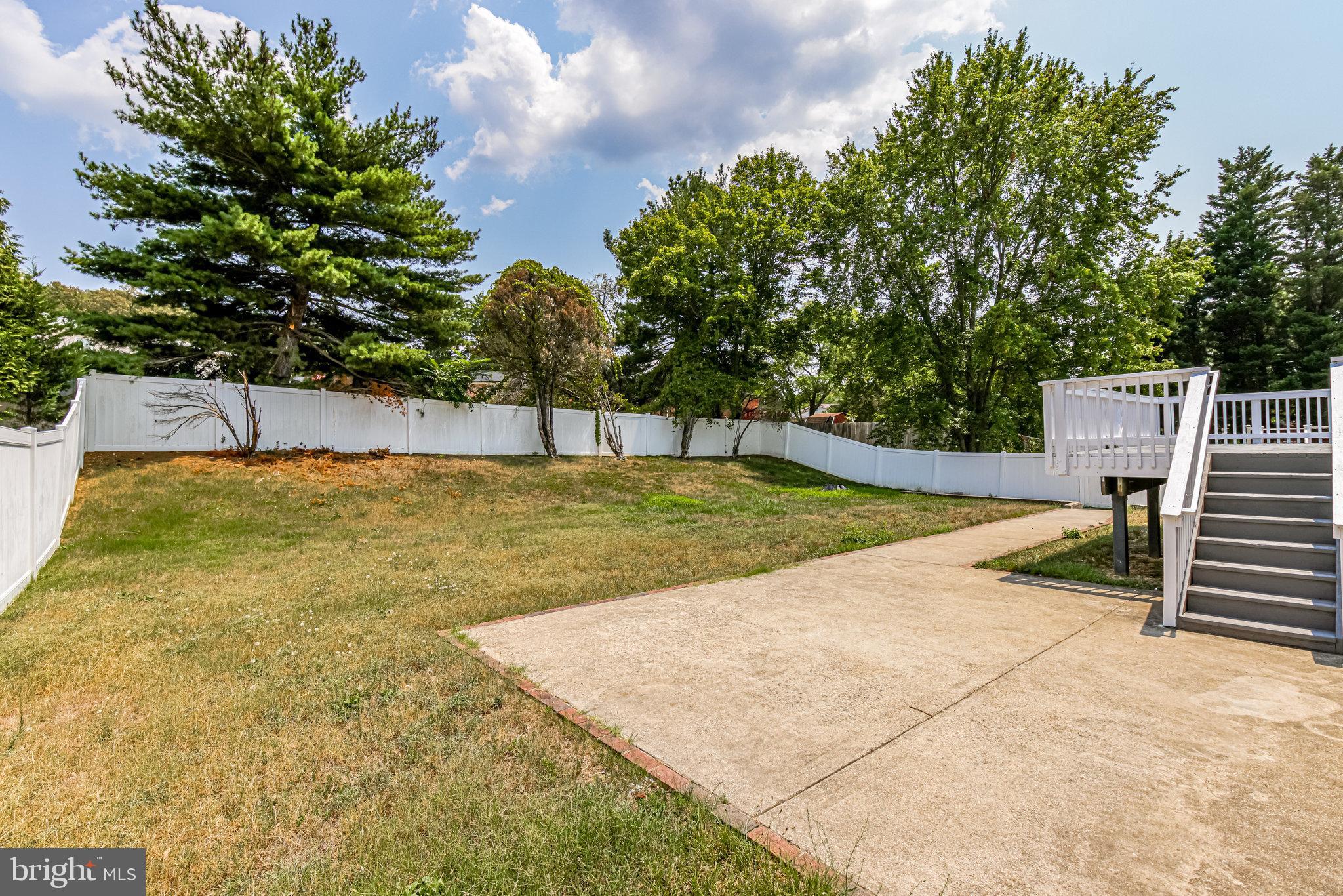 12824 Glynis Road Clinton, MD 20735 - Photo 28 of 31 cement patio plus deck