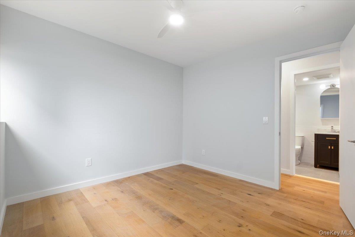 46 Hudson Street, Unit 1 Sleepy Hollow, NY 10591 - Photo 16 of 31 a view of empty room with wooden floor