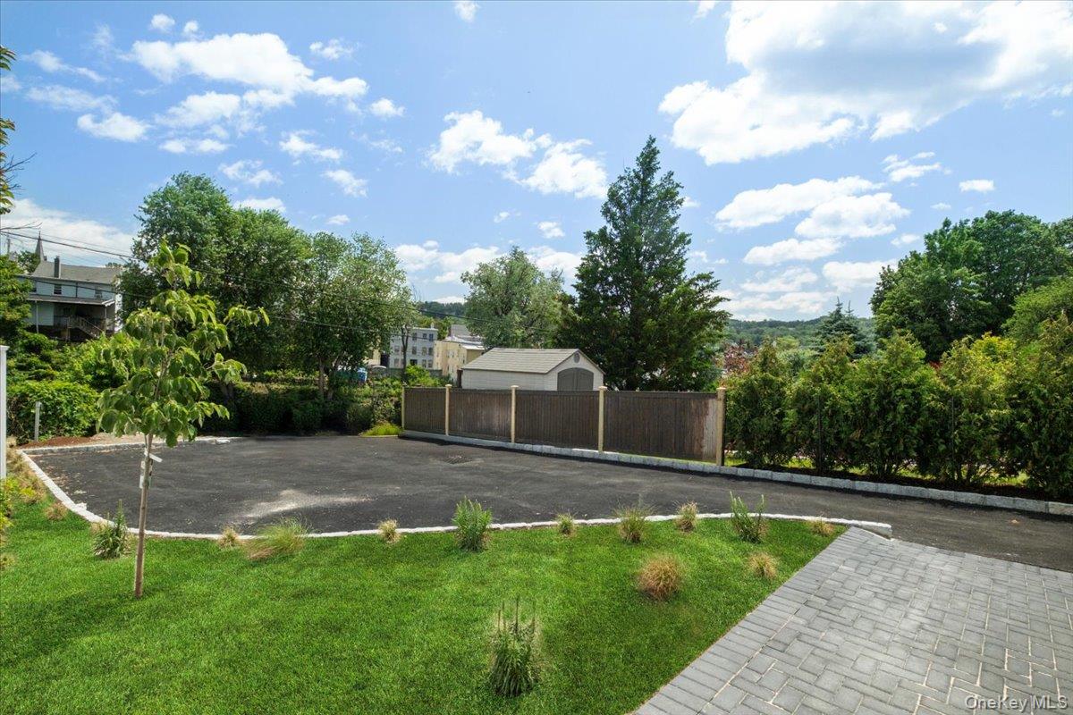 46 Hudson Street, Unit 1 Sleepy Hollow, NY 10591 - Photo 26 of 31 a view of a backyard with a garden