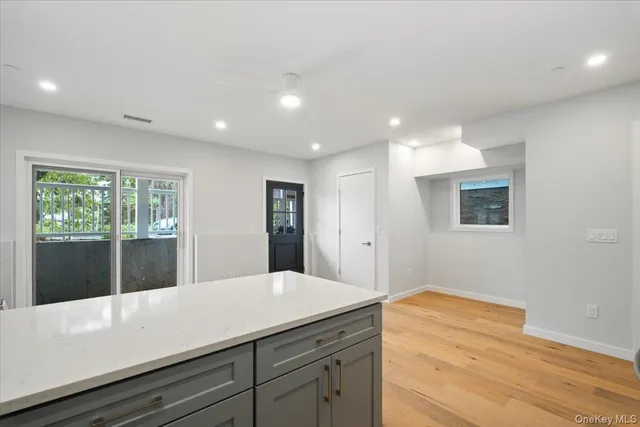 a bathroom with a sink and mirror
