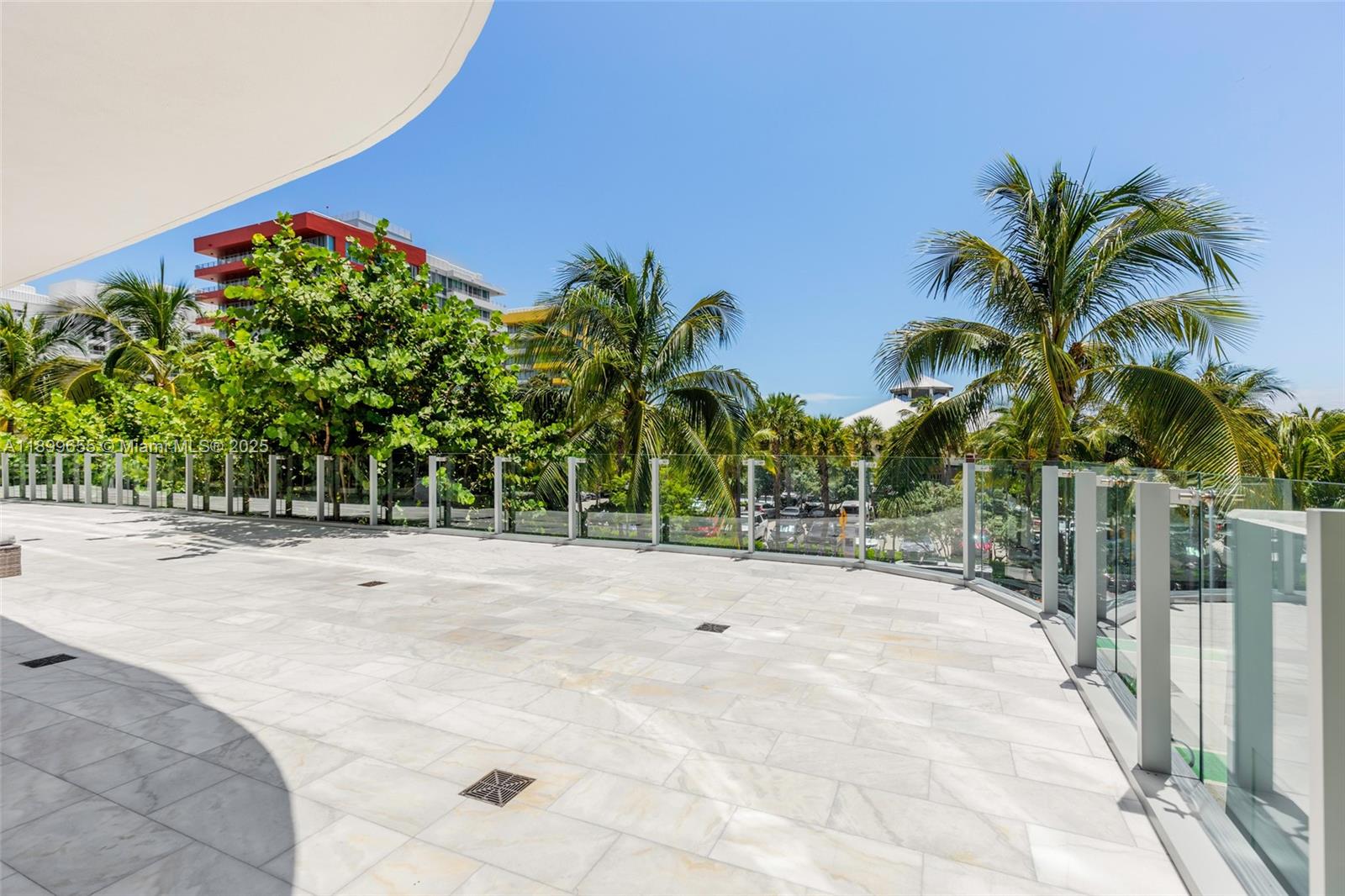 1 Collins Avenue, Unit 207 Miami Beach, FL 33139 - Photo 24 of 44 a view of a backyard of a house