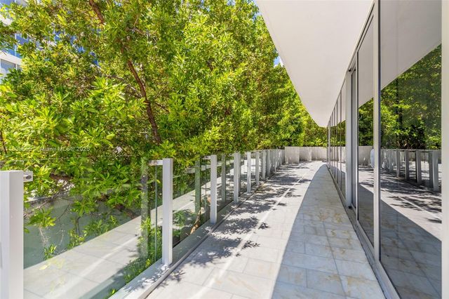 a view of balcony with furniture