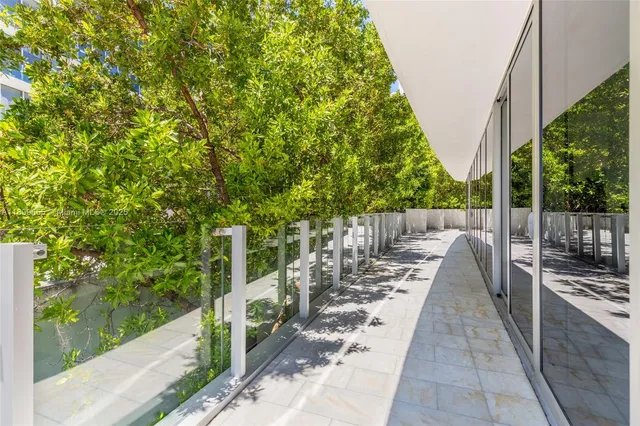a view of balcony with furniture