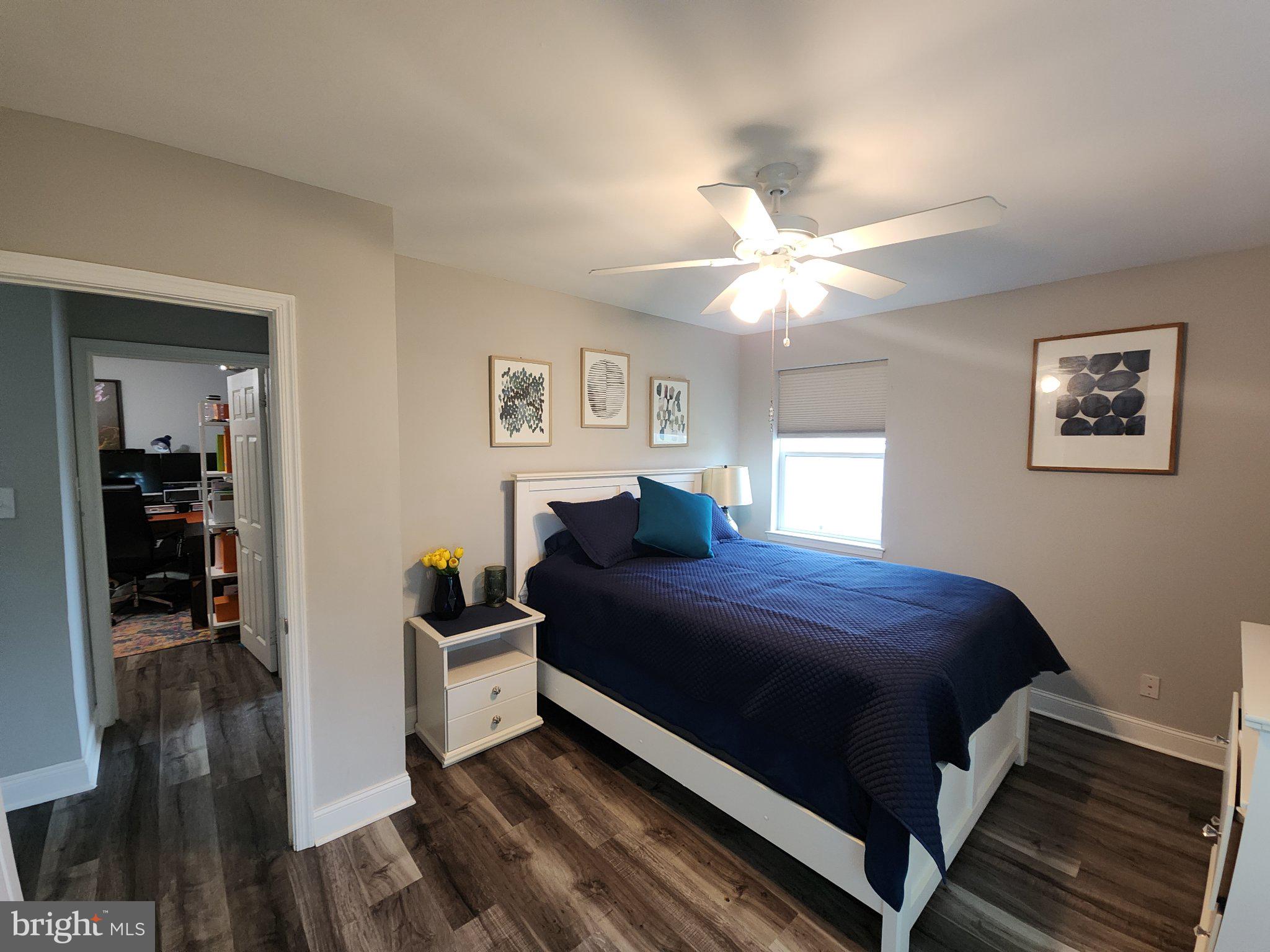 802 Devon Road Riverside, NJ 08075 - Photo 10 of 29 a bedroom with a bed and a chandelier
