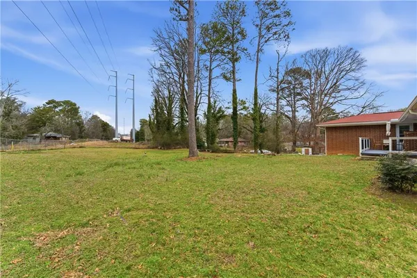 a view of a tree in front of a house