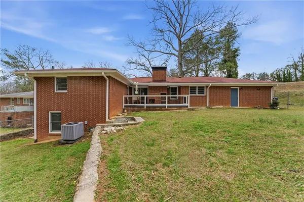 a backyard of a house with lots of green space