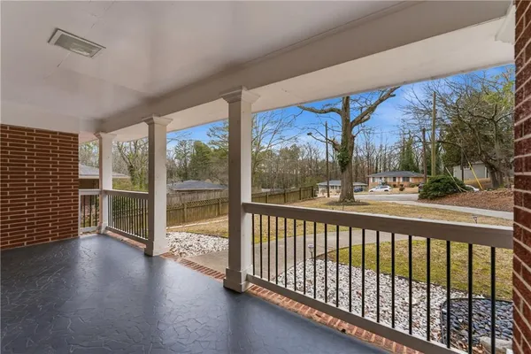 a view of a city street from a balcony