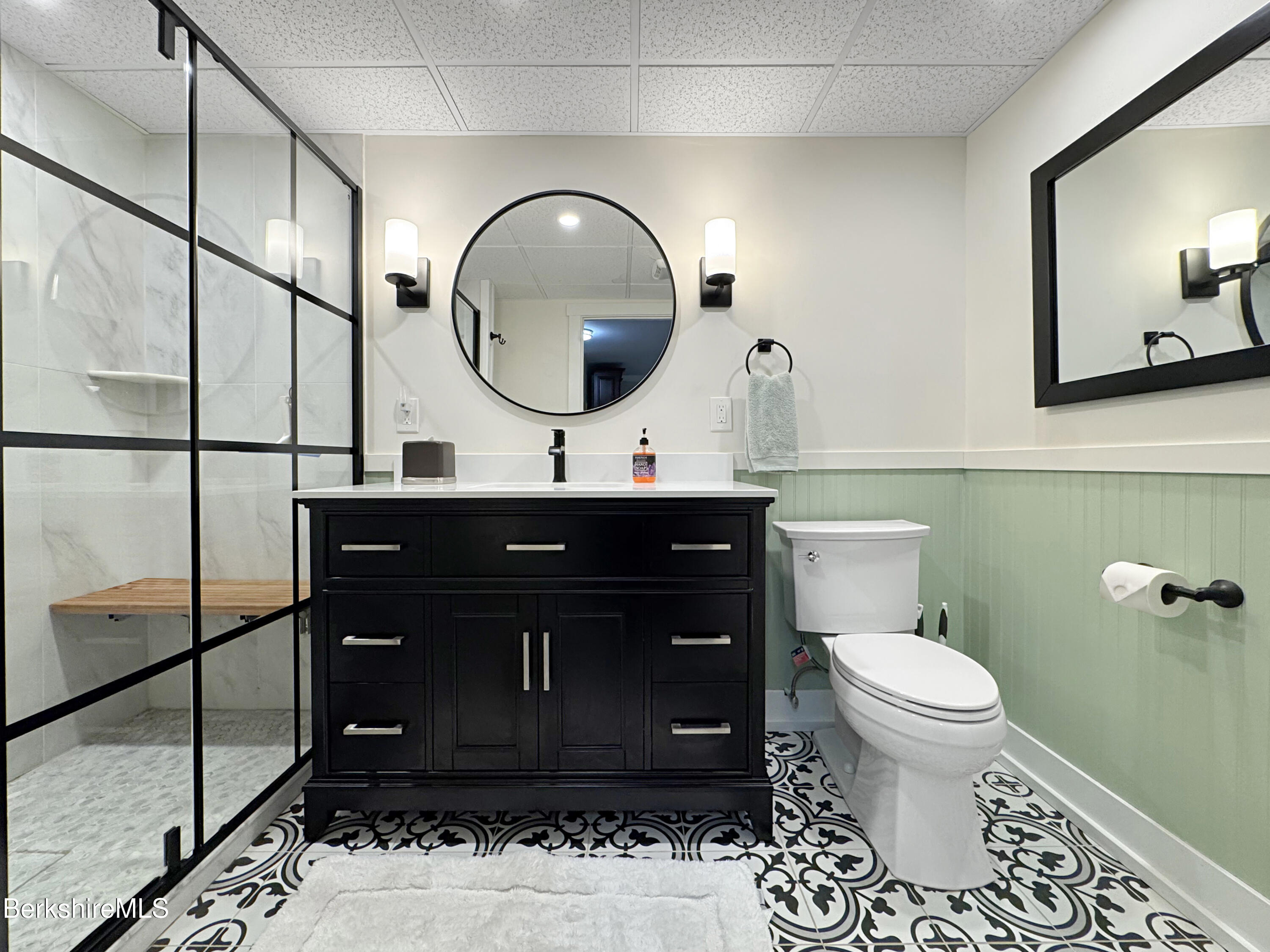5 Eastbrook Lane Pittsfield, MA 01201 - Photo 41 of 43 a bathroom with a toilet a sink and a mirror