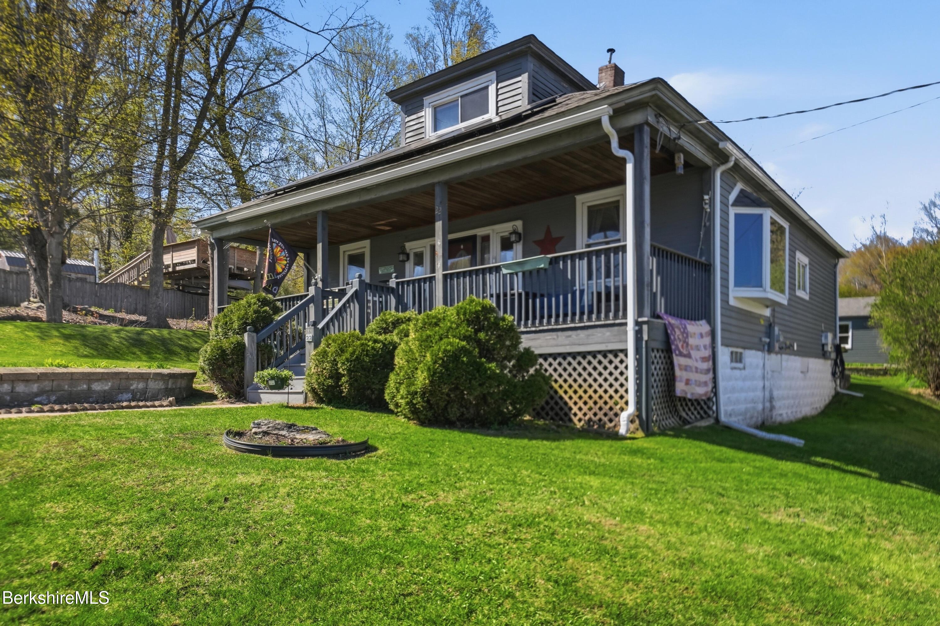 22 Broadway Street Pittsfield, MA 01201 - Photo 21 of 84 a front view of a house with a yard