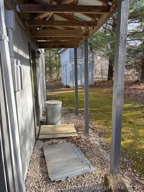 6024 Little Patoka Road Taswell, IN 47175 - Photo 24 of 26 Back of the cabin with a view of the shed