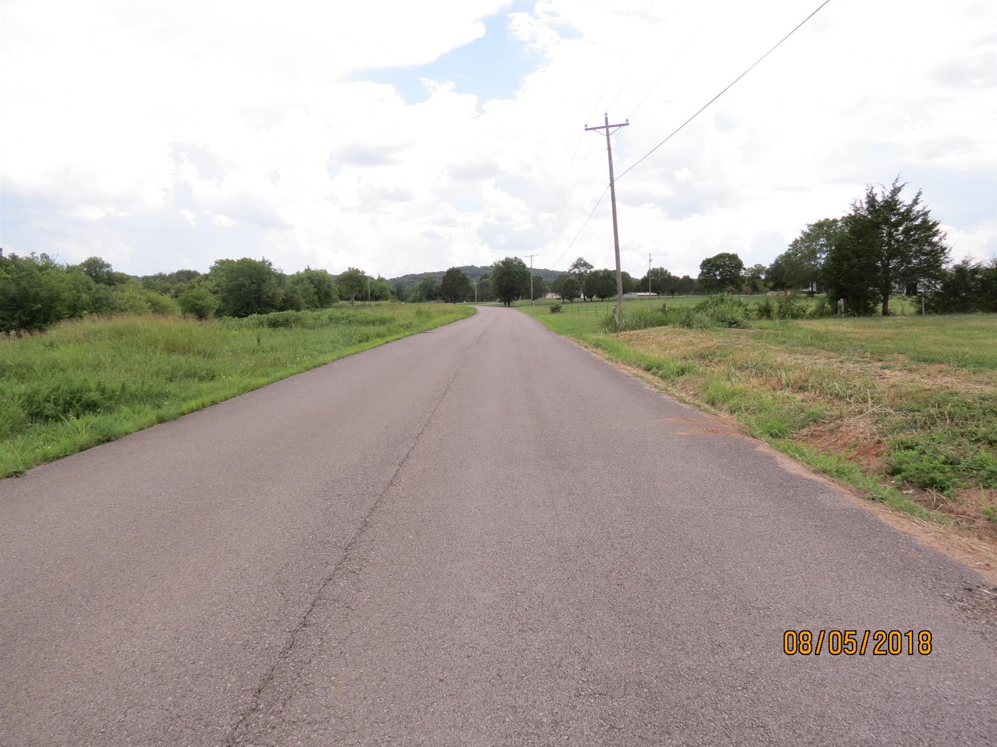 10 Cedar Forest Road Lebanon, TN 37090 - Photo 2 of 5 a view of a field with a big yard and palm trees