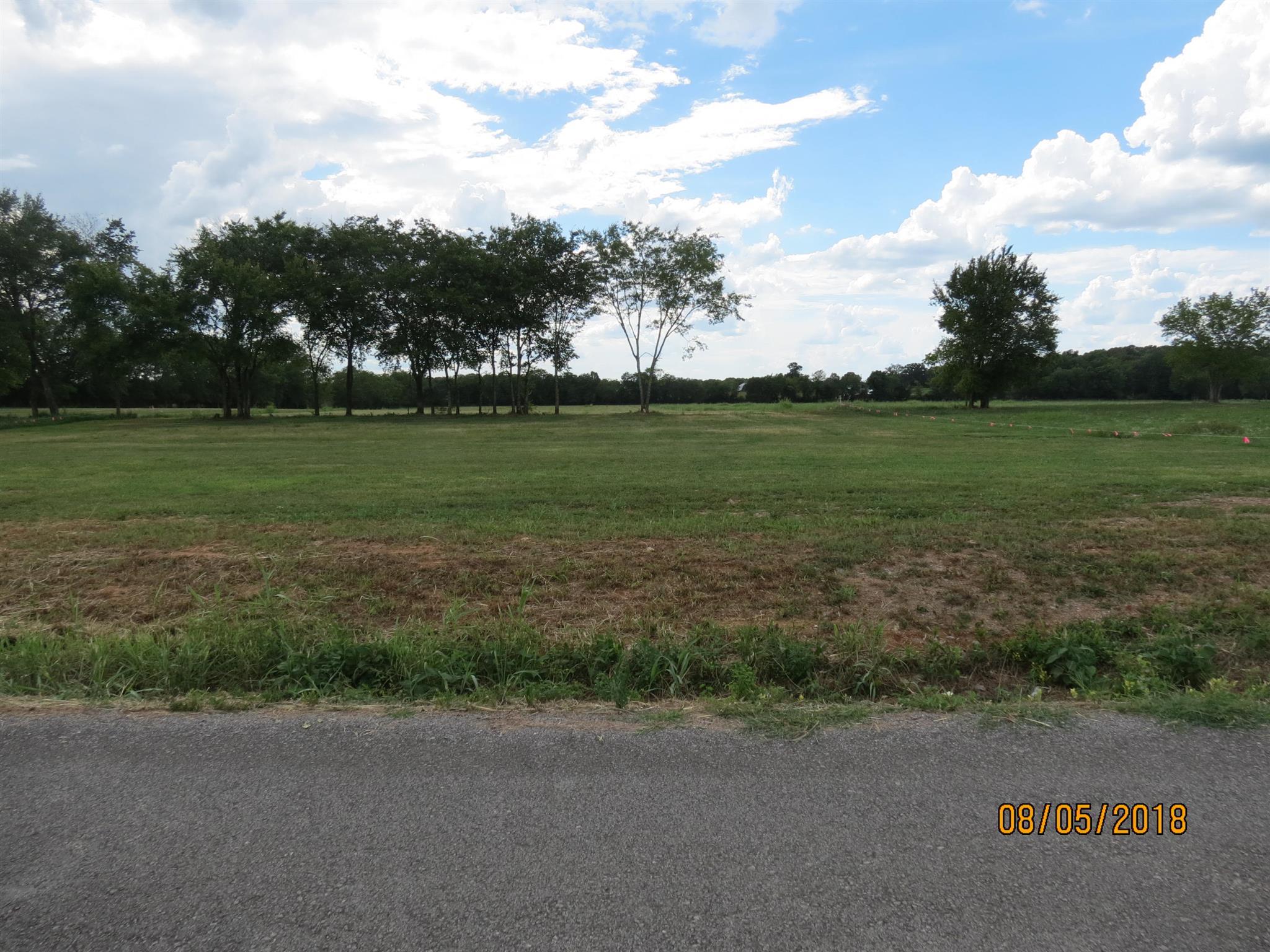 10 Cedar Forest Road Lebanon, TN 37090 - Photo 4 of 5 a view of a field of grass and trees