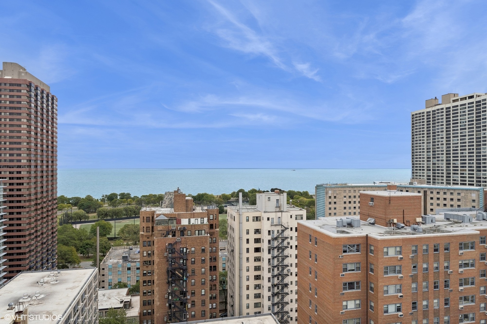 2930 North Sheridan Road, Unit 301 Chicago, IL 60657 - Photo 17 of 20 a view of a city with tall buildings