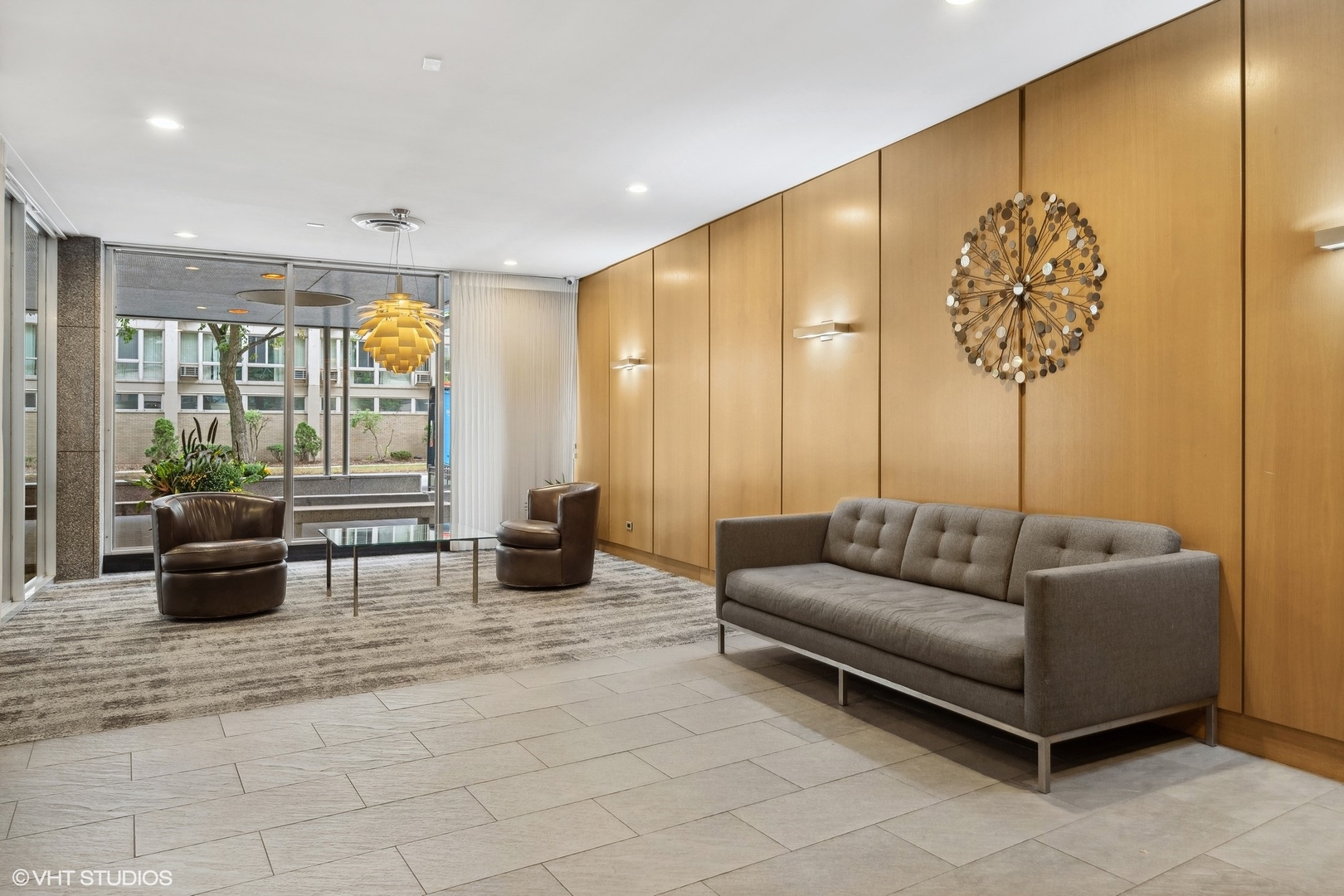 2930 North Sheridan Road, Unit 301 Chicago, IL 60657 - Photo 18 of 20 a living room with furniture and a large window
