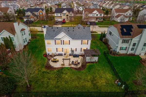 an aerial view of a house with garden