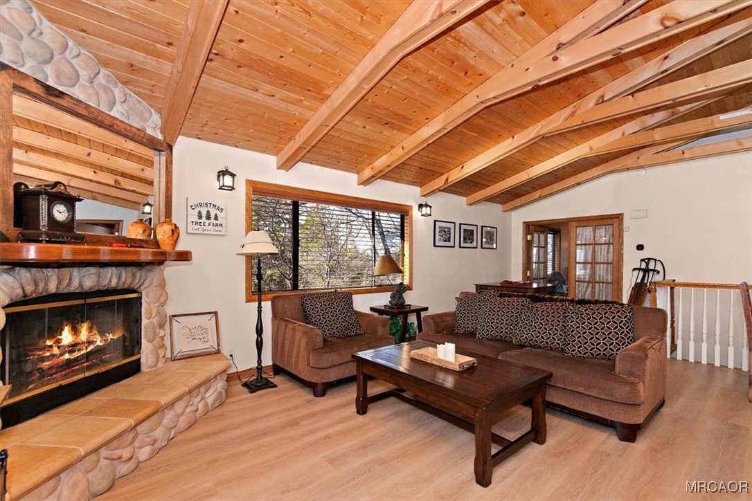 1584 Wolf Road Big Bear City, CA 92314 - Photo 16 of 33 a living room with furniture and a fireplace
