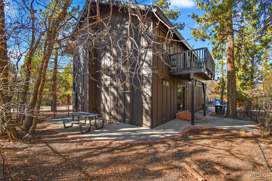 1584 Wolf Road Big Bear City, CA 92314 - Photo 28 of 33 a street view with tall buildings