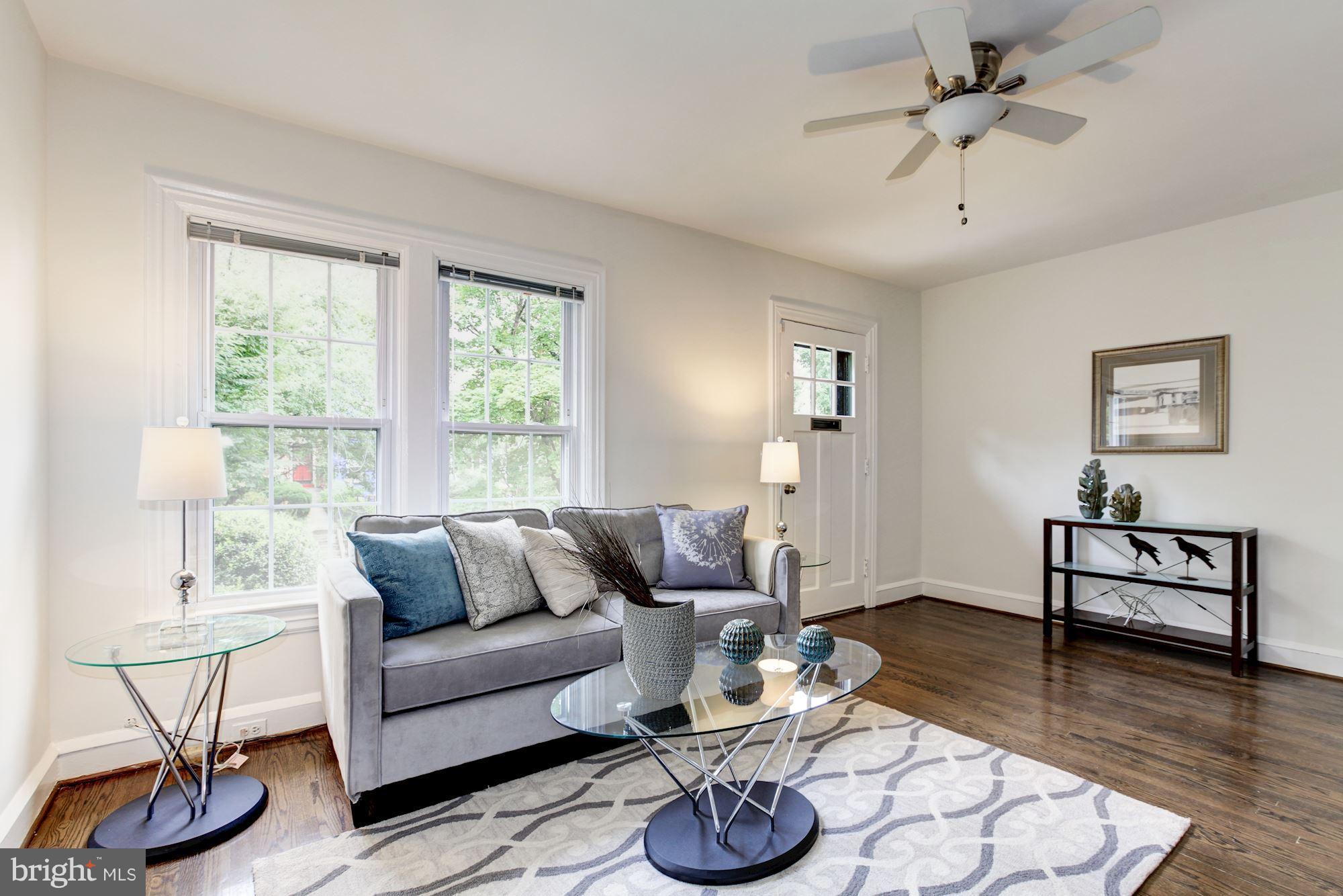 3523 S Street Northwest Washington, DC 20007 - Photo 2 of 15 a living room with furniture and a wooden floor