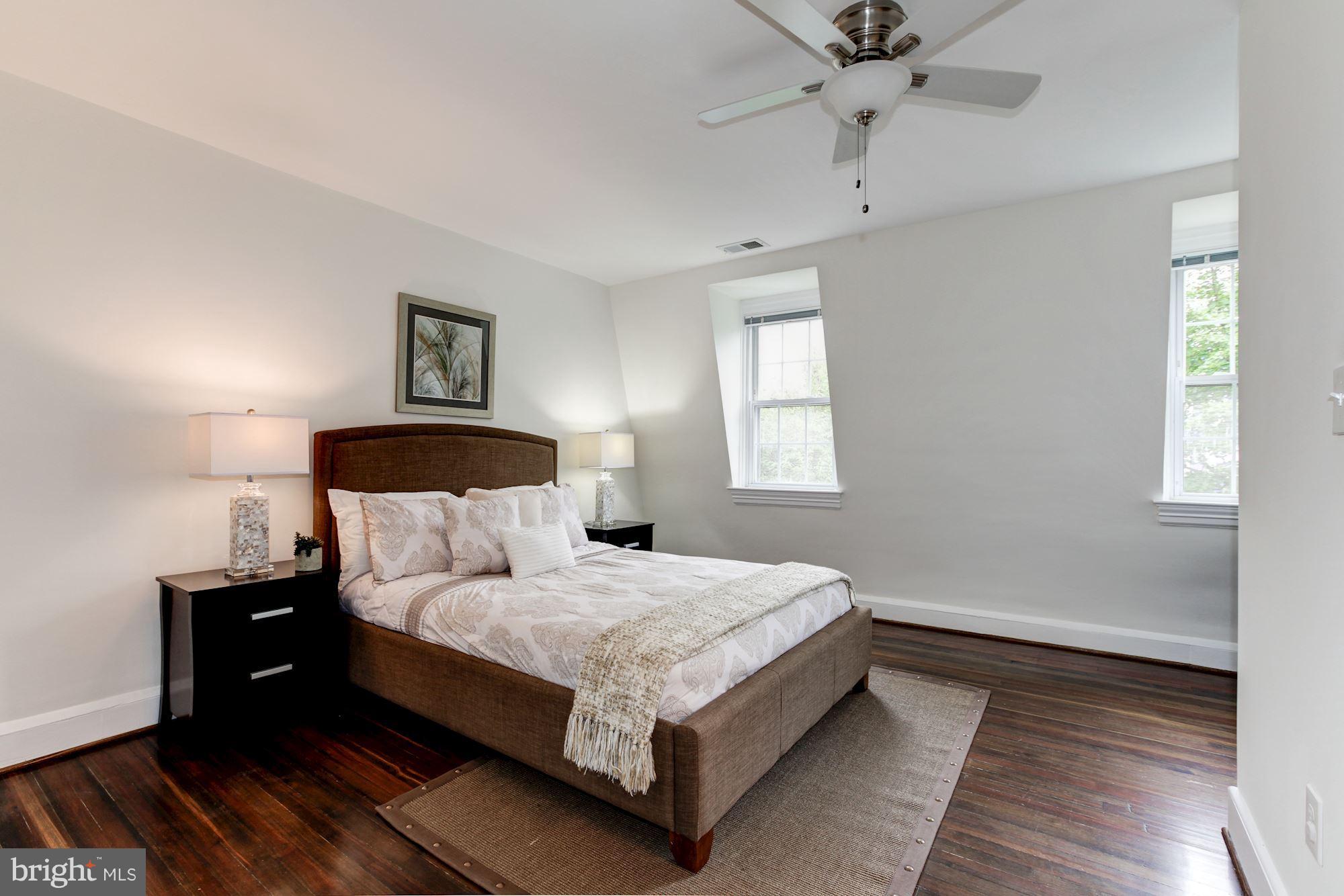 3523 S Street Northwest Washington, DC 20007 - Photo 5 of 15 a bedroom with a bed and window