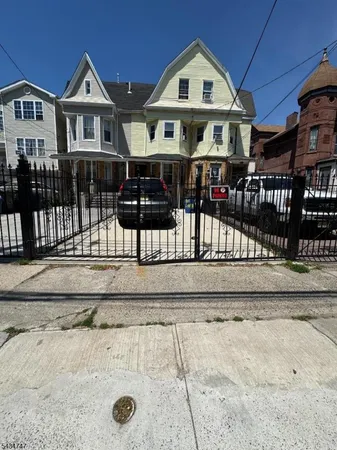 a front view of a house with a porch
