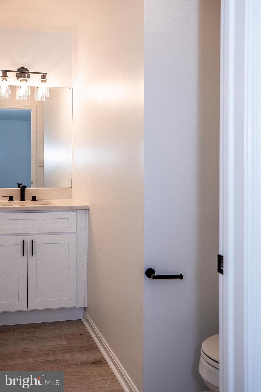 24 Amberly Way Lititz, PA 17543 - Photo 20 of 38 a bathroom with a sink a toilet and vanity