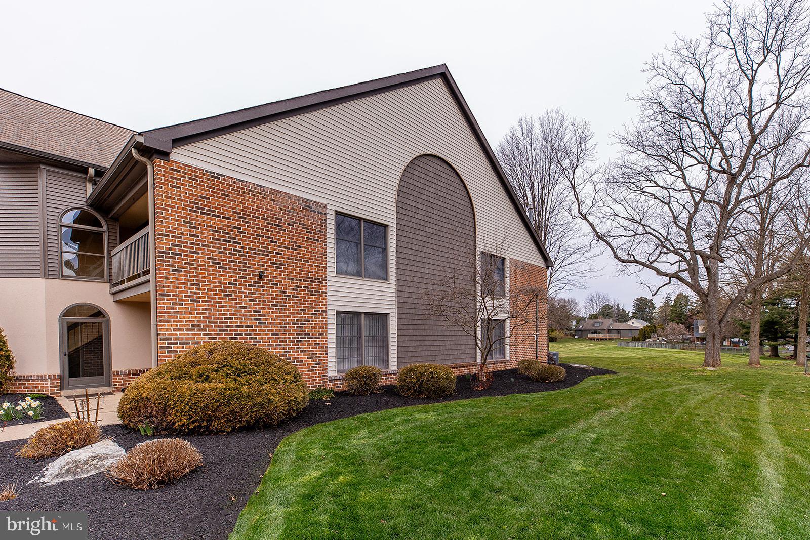 24 Amberly Way Lititz, PA 17543 - Photo 3 of 38 a front view of house with a garden