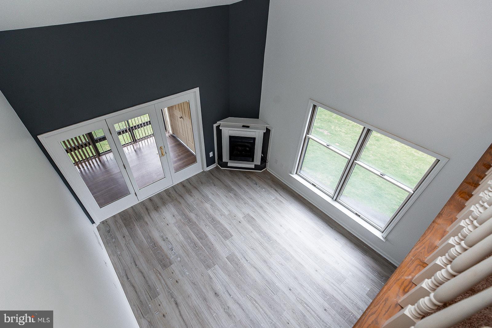 24 Amberly Way Lititz, PA 17543 - Photo 31 of 38 a view of an empty room with wooden floor and a window