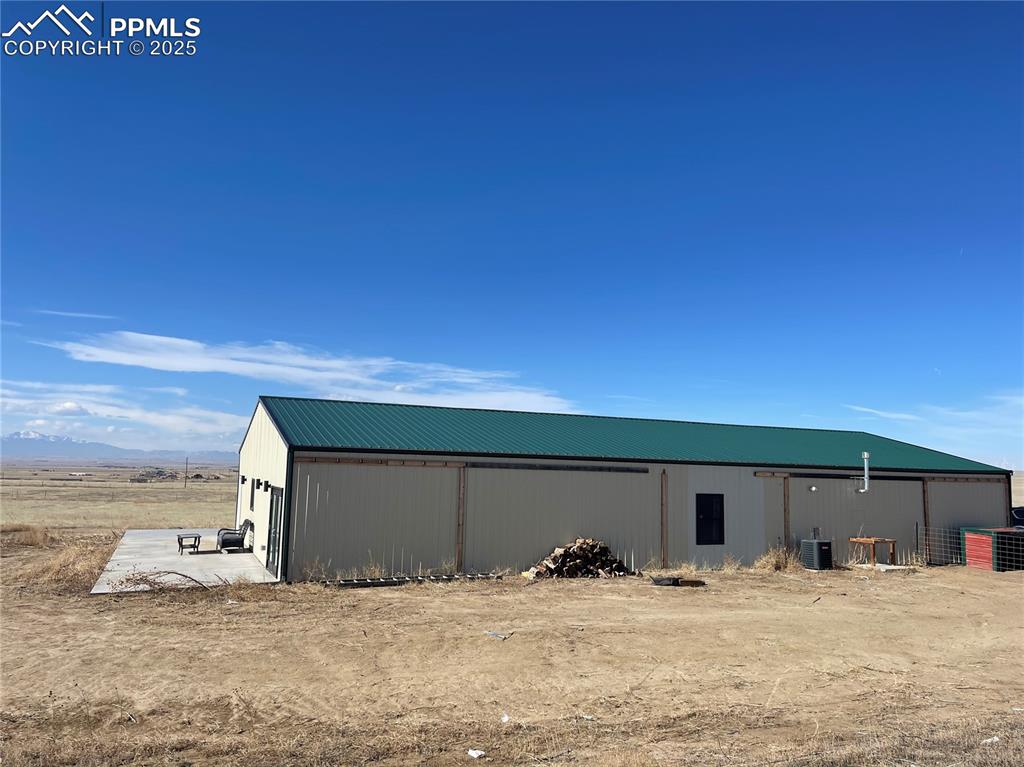 32215 Big Springs Road Yoder, CO 80864 - Photo 5 of 17 a big room with a bed