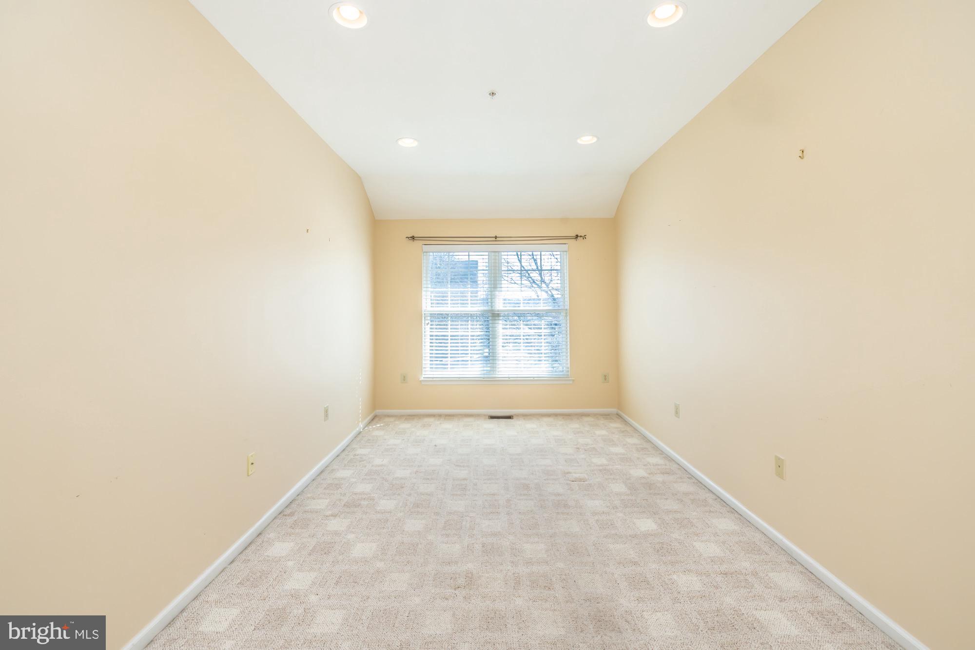 145 Madison Way Downingtown, PA 19335 - Photo 12 of 45 a view of an empty room with a window