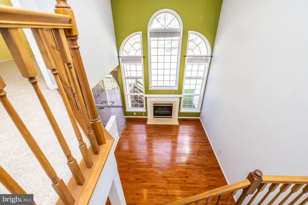 a view of an entryway with wooden floor