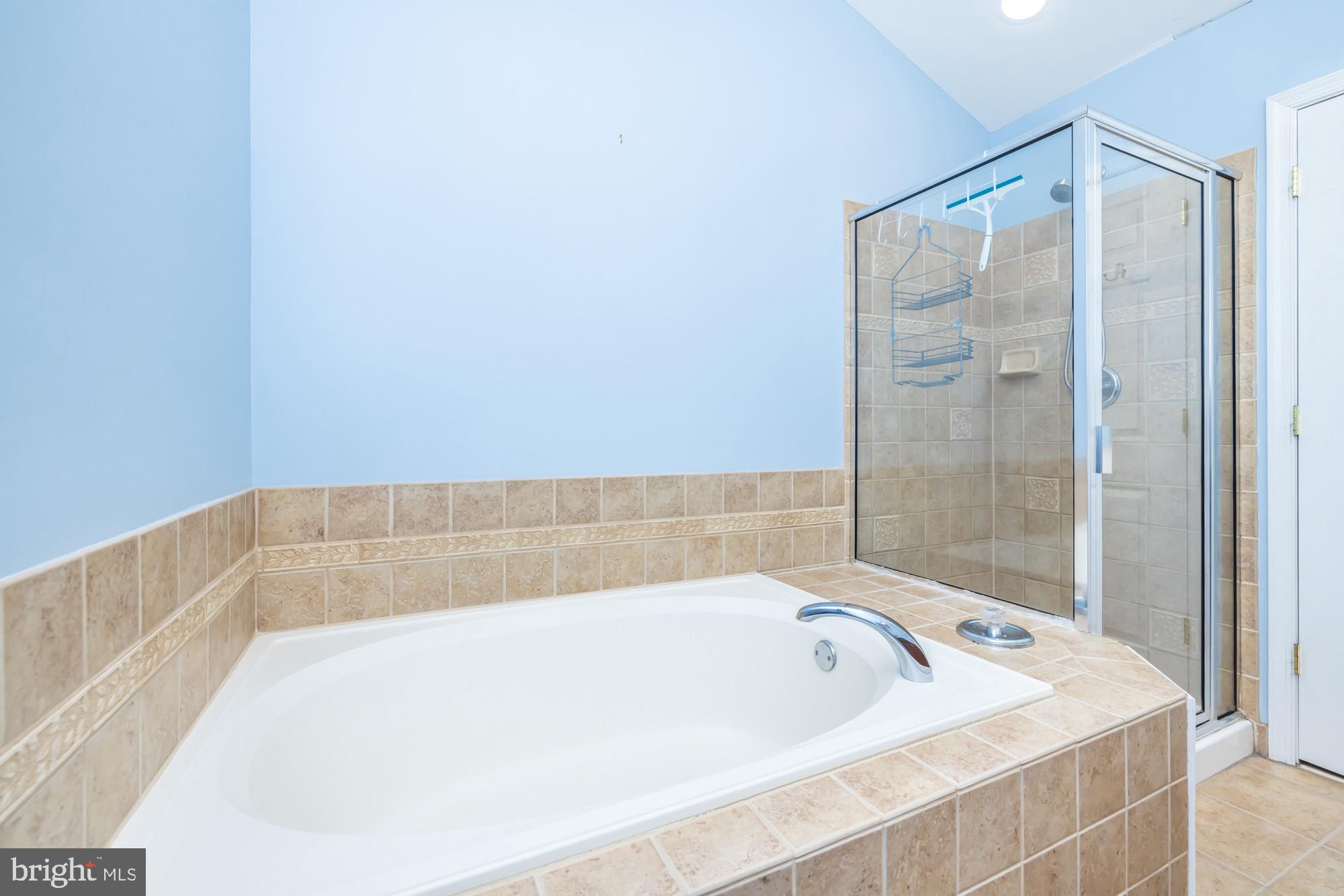 145 Madison Way Downingtown, PA 19335 - Photo 34 of 45 a bathroom with a bathtub and shower