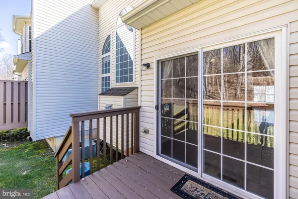a front view of a house with a swimming pool