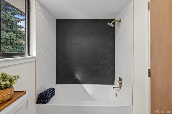 a bathroom with a bathtub