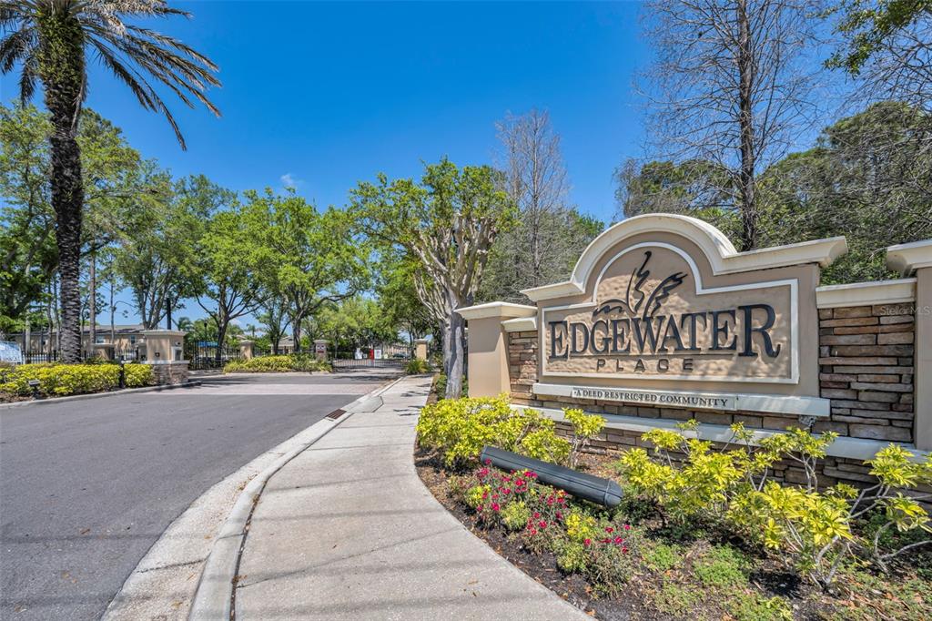 8015 Savannah Sunset Lane Tampa, FL 33615 - Photo 3 of 35 a view of a street with a building in the background
