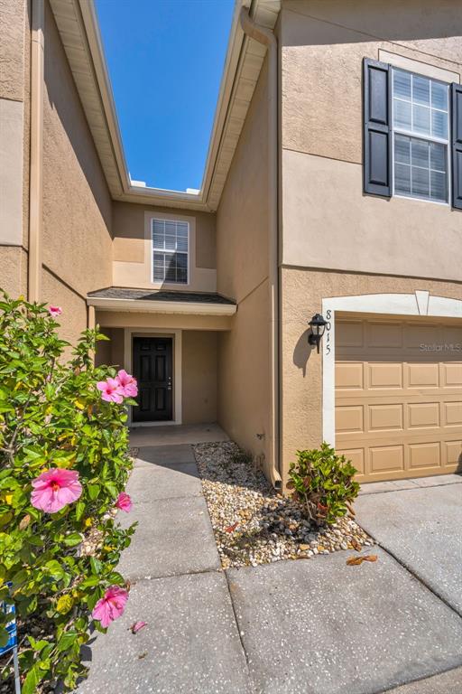 8015 Savannah Sunset Lane Tampa, FL 33615 - Photo 5 of 35 a front view of a house