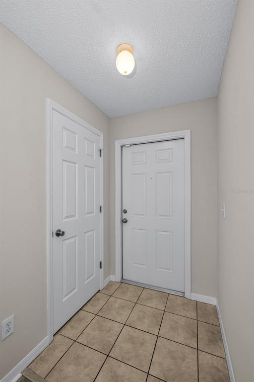 8015 Savannah Sunset Lane Tampa, FL 33615 - Photo 6 of 35 a view of an empty room