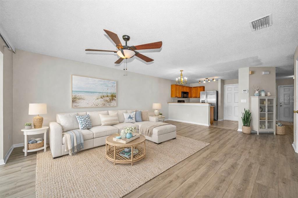 8015 Savannah Sunset Lane Tampa, FL 33615 - Photo 8 of 35 a living room with furniture