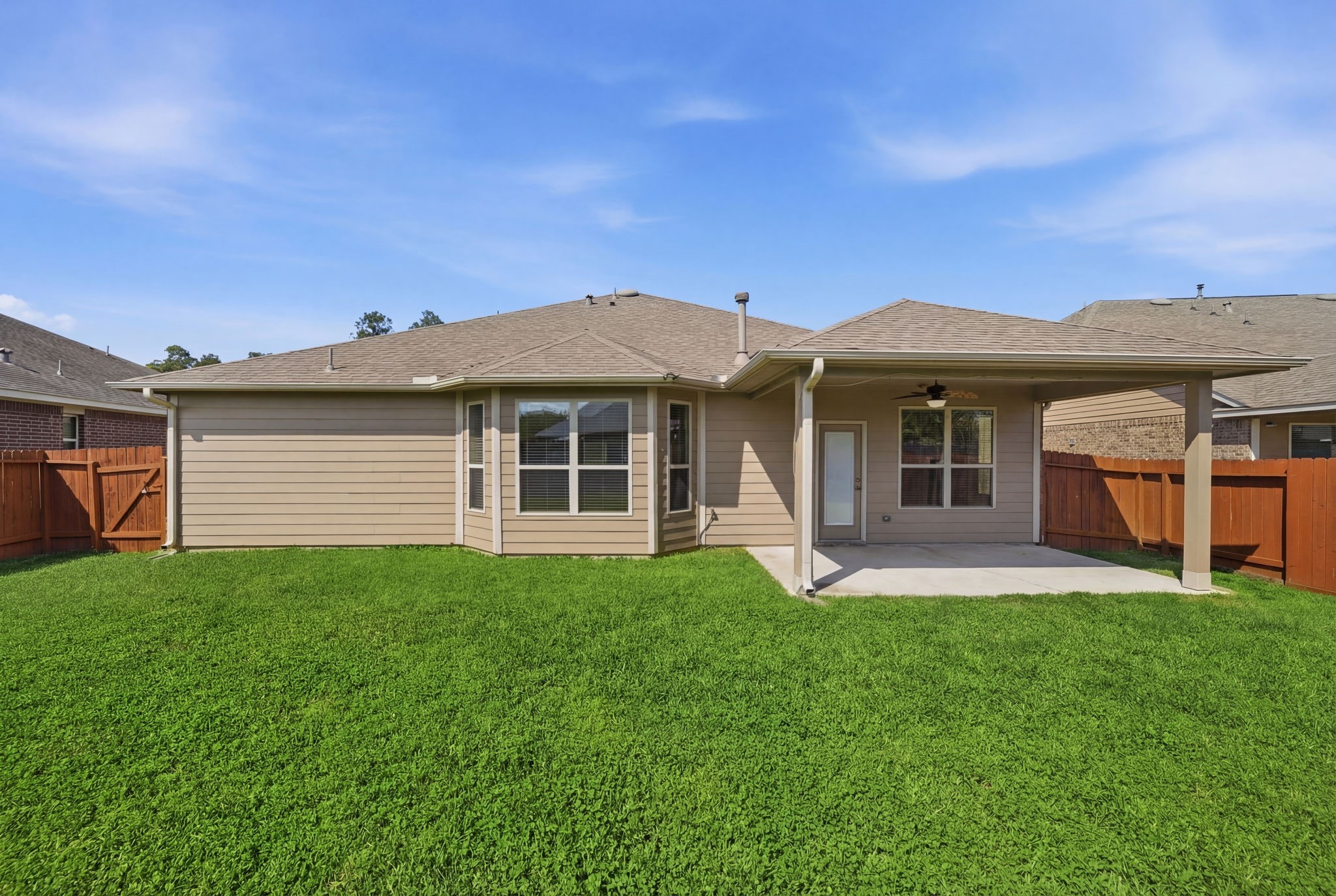 7618 Willow School Drive Spring, TX 77389 - Photo 12 of 19 a front view of a house with a yard