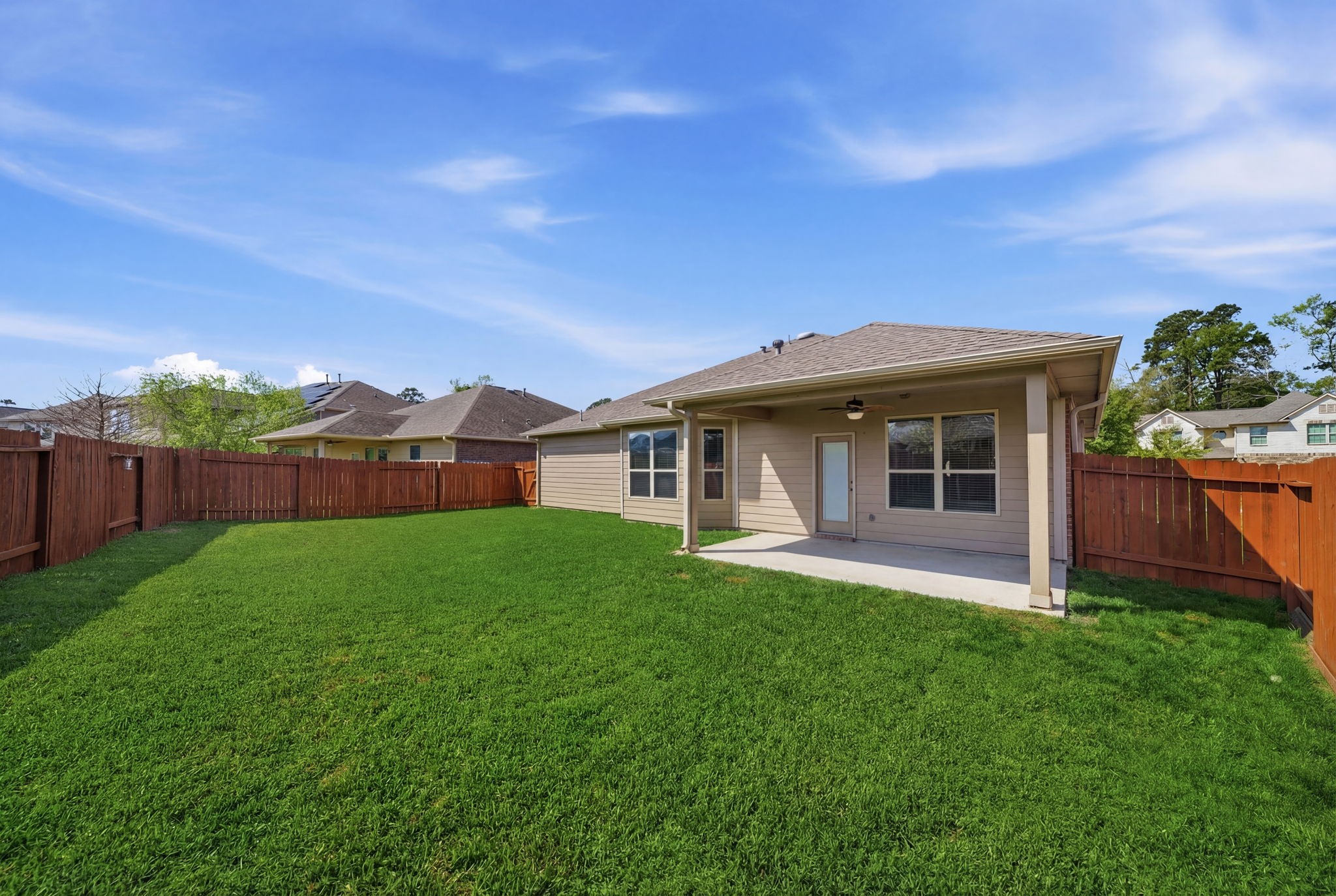 7618 Willow School Drive Spring, TX 77389 - Photo 13 of 19 a front view of a house with a garden and yard