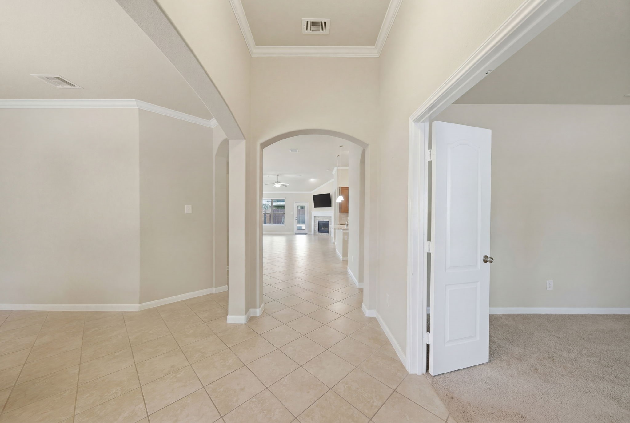 7618 Willow School Drive Spring, TX 77389 - Photo 3 of 19 a view of a hallway view with wooden floor and staircase