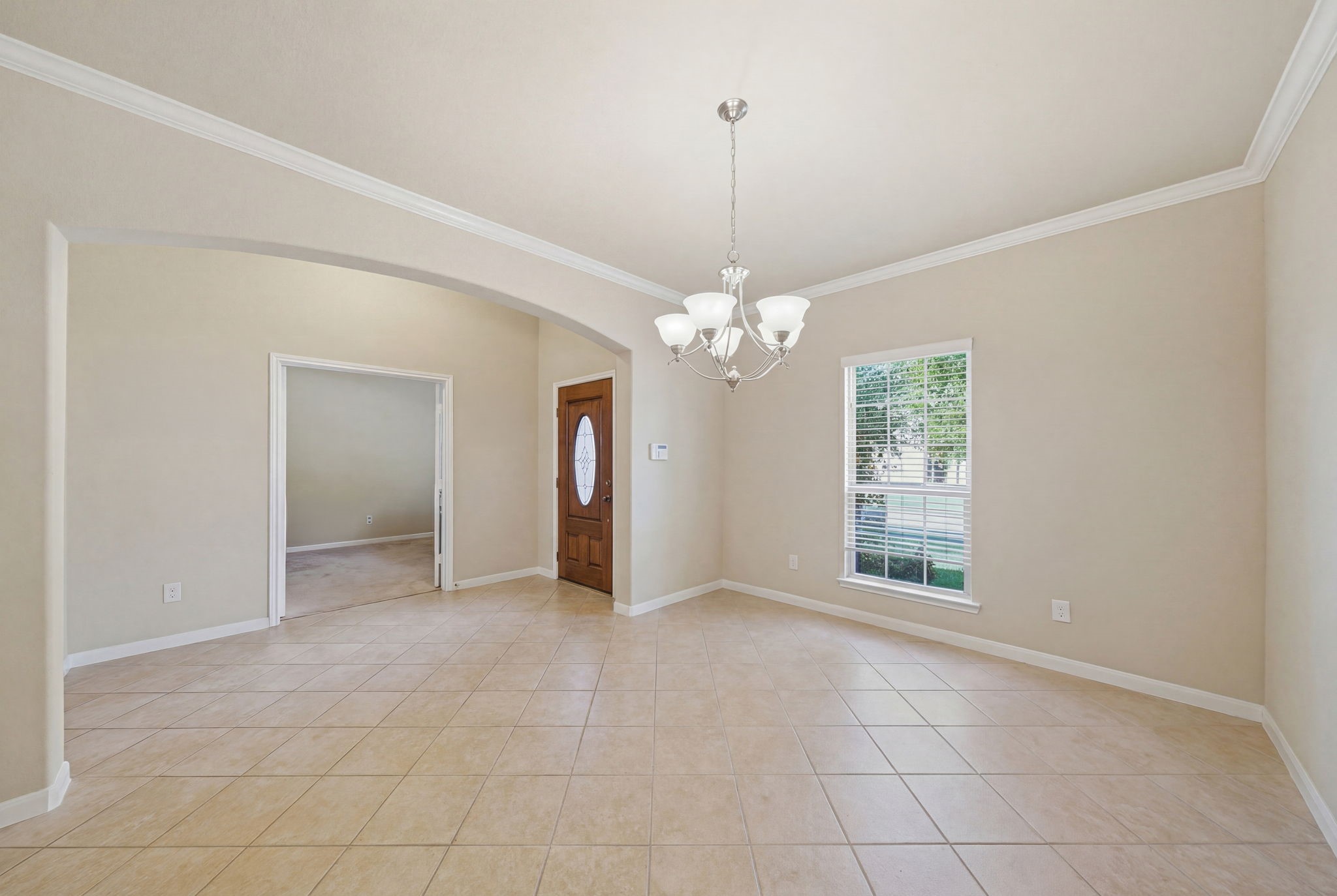 7618 Willow School Drive Spring, TX 77389 - Photo 5 of 19 a view of an empty room with a window